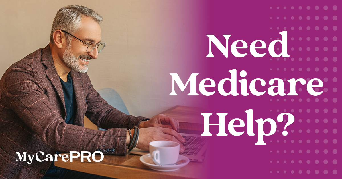 An older couple reviewing Medicare paperwork together with an advisor
